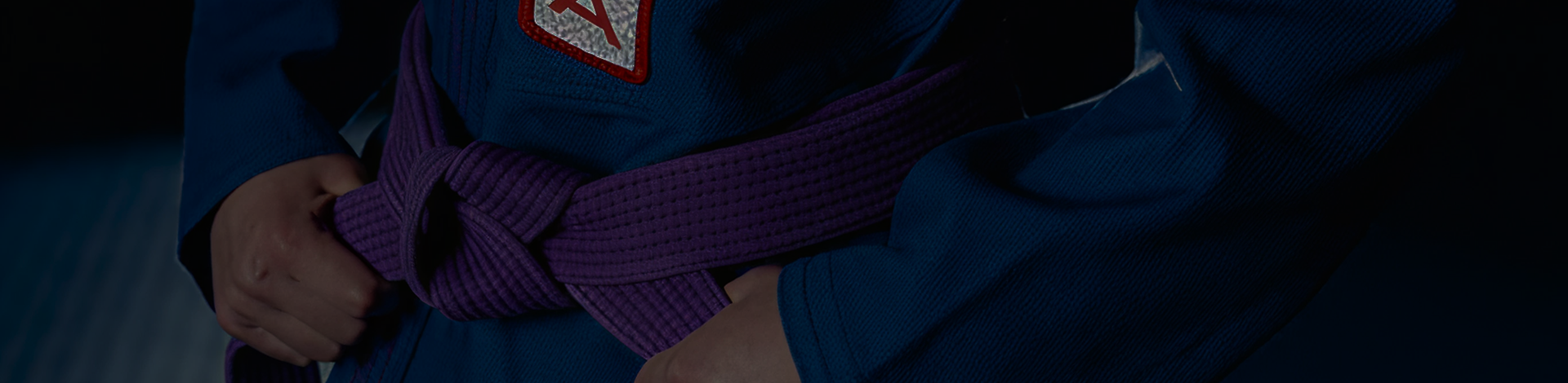 Faixa de Jiu-Jitsu sobre um kimono